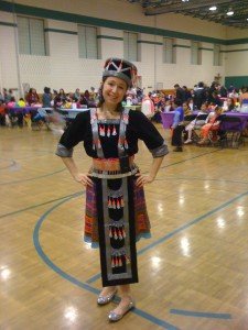 Elizabeth Camozzi at Noble Academy's Hmong New Year (in traditional dress)