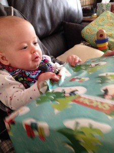 Ella Mae opening a gift...